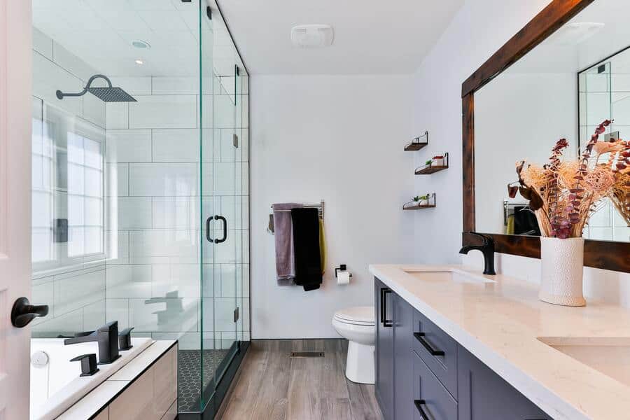 Interior Of Hotel Bathroom With Wooden Floor