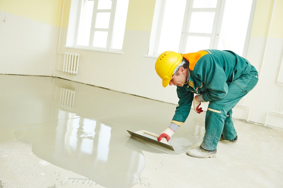 Plasterer During Floor Covering Works