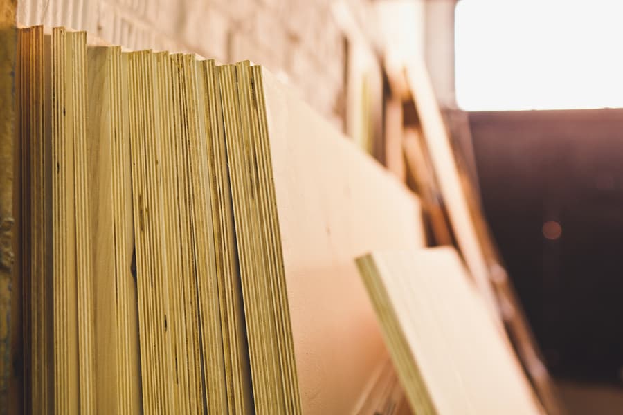 Stack Of Plywood In Workshop