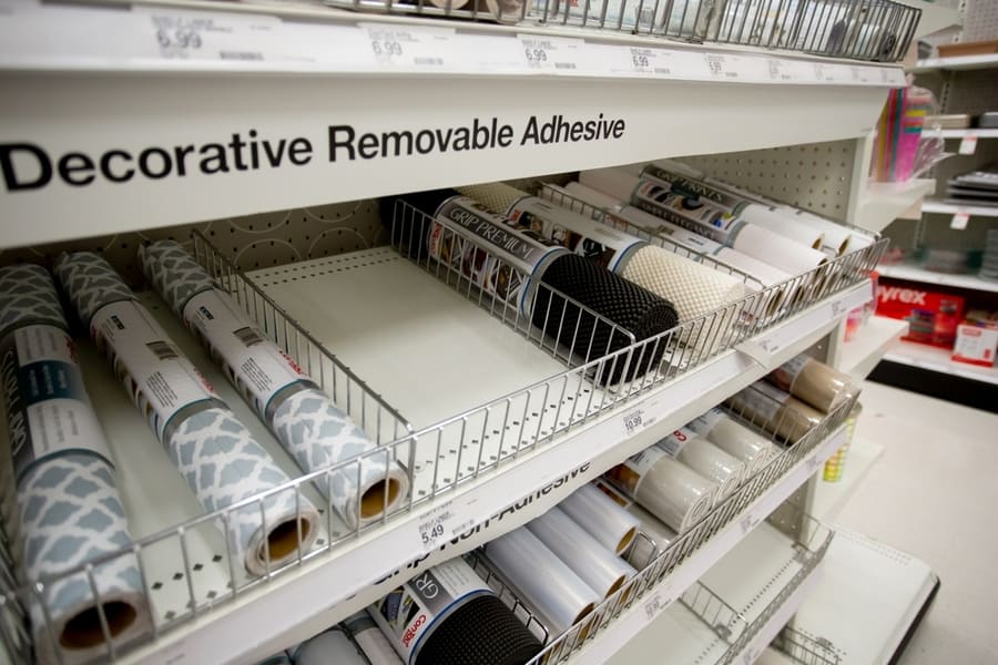 A View Of Several Shelf Dedicated To Rolls Of Drawer Liner, On Display At A Local Department Store.