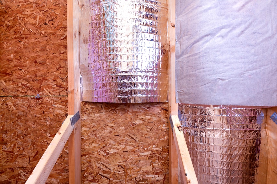 Attic Insulating With Reflective Heat Barrier