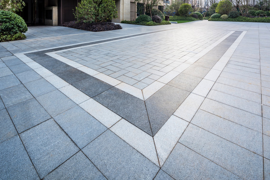 Grey Marble Floor Tiles On Garden Square In Residential Area