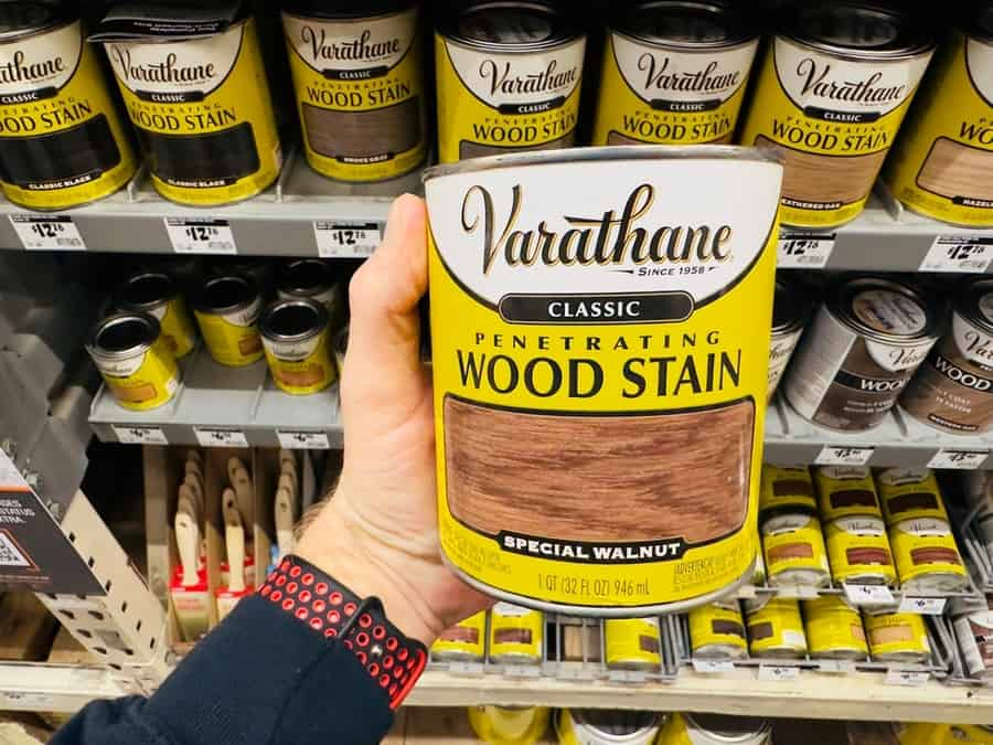 Man Choosing A Stain Color