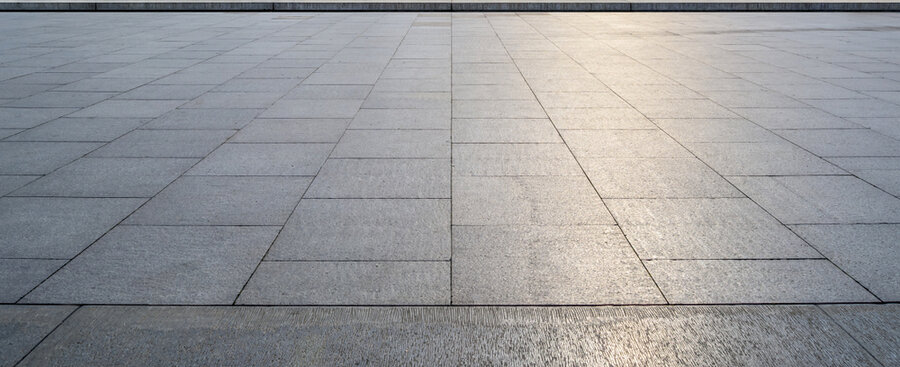 Perspective View Of Monotone Gray Brick Stone On The Ground For Street Road