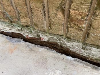 Sinking Concrete Foundation In Need Of Mudjacking Leveling Repair