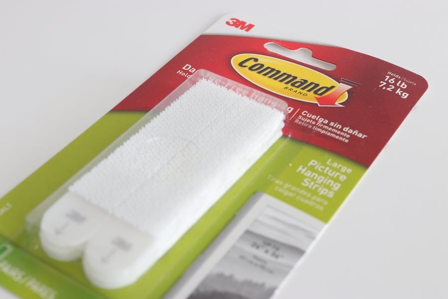 Unopened Pack Of 3M Picture Hanging Strips Against White Background.