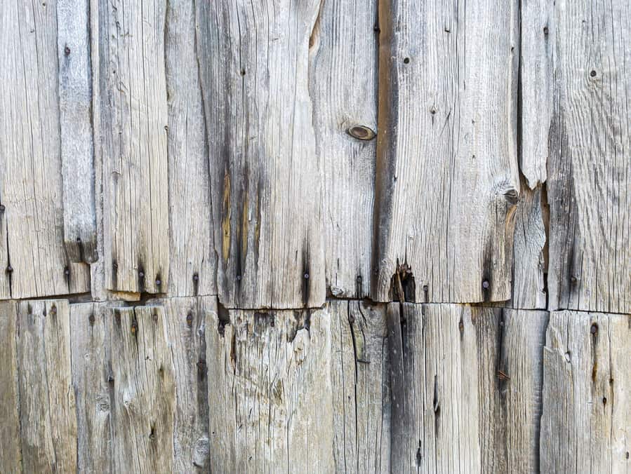 Weathered Rustic Wood Background With Damaged Grey Planks