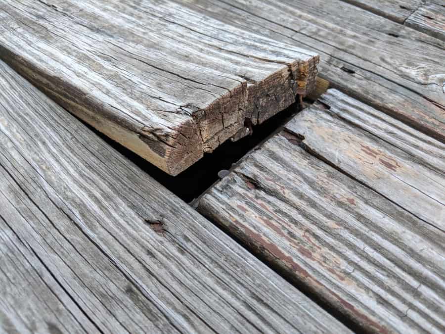 Wooden Deck Floor Boards Coming Up That Are Old