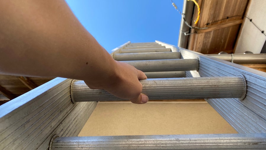 Man Climbing The Ladder