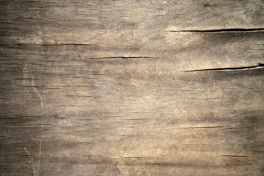 The Texture Of Old Wood Plywood Cracked By Moisture Is Gray With Cracks