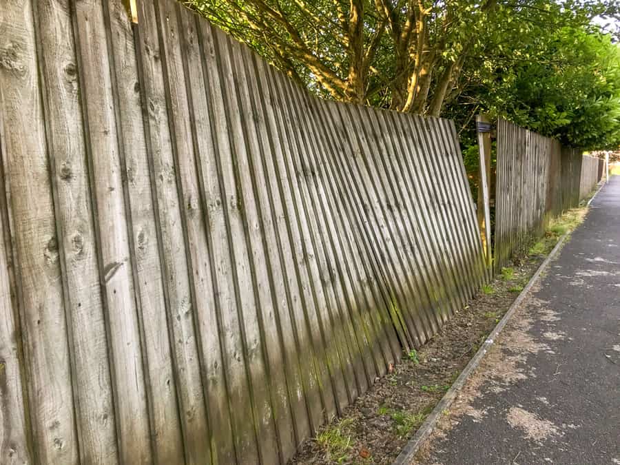 Wooden Fence Damaged Due To Pressure