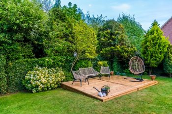 A New Wooden Deck In A Garden