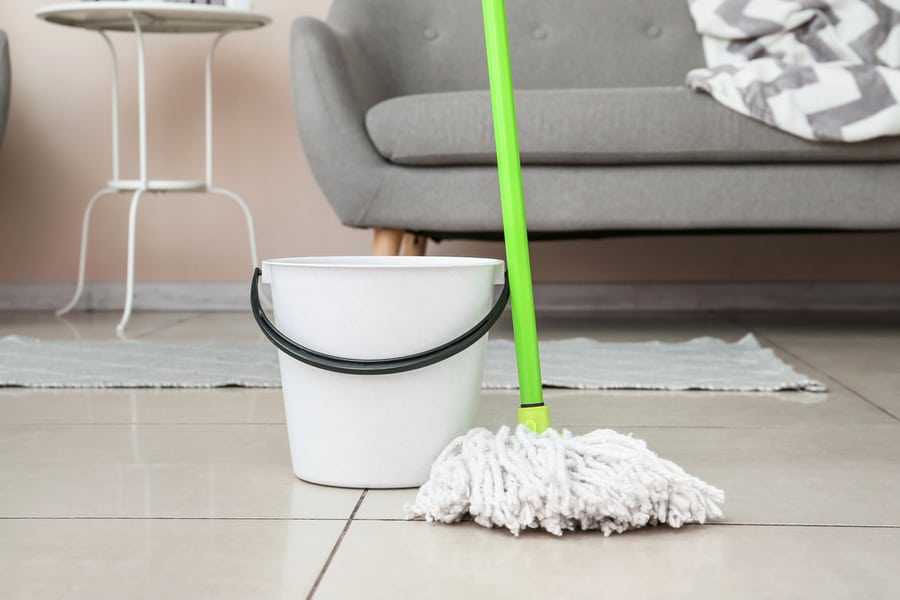 Bucket And Floor Mop In Room