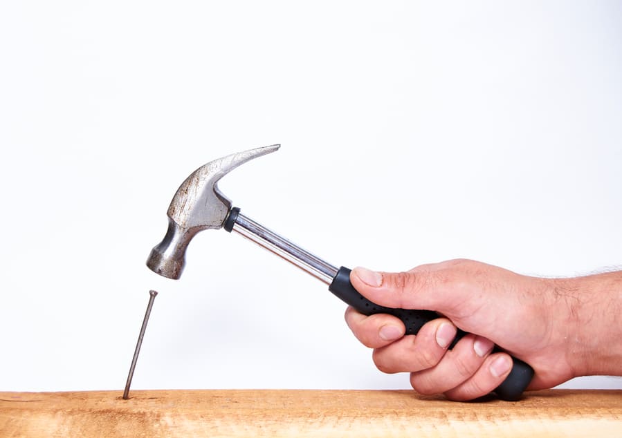 Hand Hammering A Nail