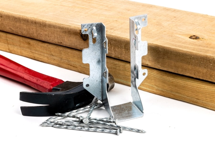 Joist Hangers With Hammer And Nails