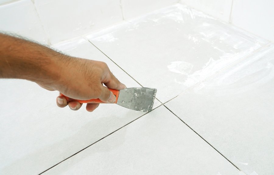 Replacing The Old Grout Between The Tiles