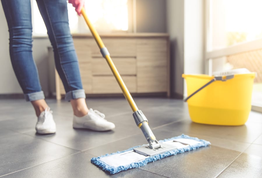Using A Flat Wet-Mop While Cleaning Floor